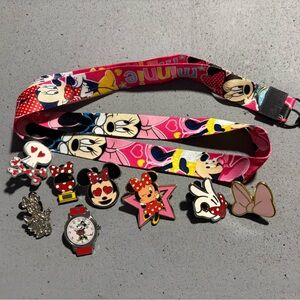 Minnie Mouse lanyard and 8 Disney pins